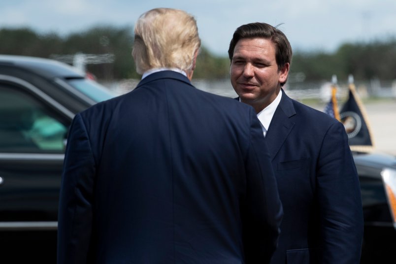 DeSantis And Trump Bury Hatchet To Join Hands On Sick Immigrant Detainees Stunt